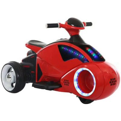 Viajar en una motocicleta eléctrica infantil de tres ruedas con ruedas intermitentes y música