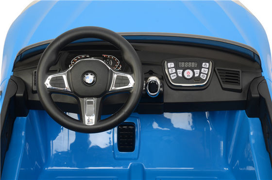 Juguetes eléctricos competitivos de 12 voltios Los niños viajan en automóviles eléctricos con material plástico