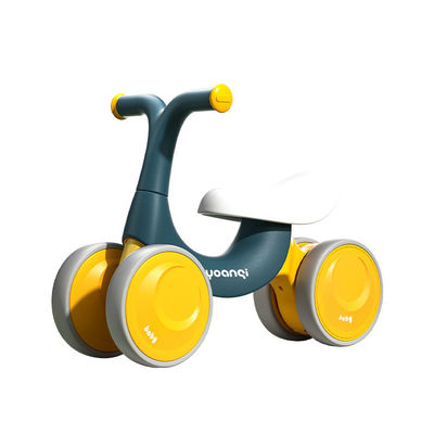 Carro de equilibrio de bebé de plástico naranja con patinaje en rodillos silencioso y diseño verde