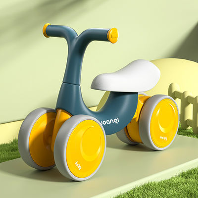 Carro de equilibrio de bebé de plástico naranja con patinaje en rodillos silencioso y diseño verde