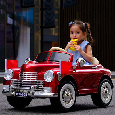 Pintura roja/negra Niños eléctricos viajan en coches 12V con USB/MP3 para niños