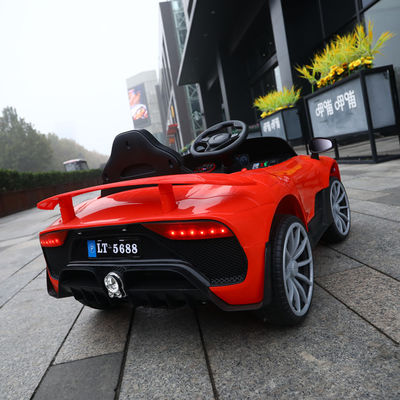 380*2 motor 2.4g RC coche eléctrico con puerta de apertura y 4 ruedas para niños de 2 a 10 años