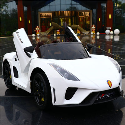 Unisex niños 12v coche eléctrico con control remoto doble conducción música y función de swing