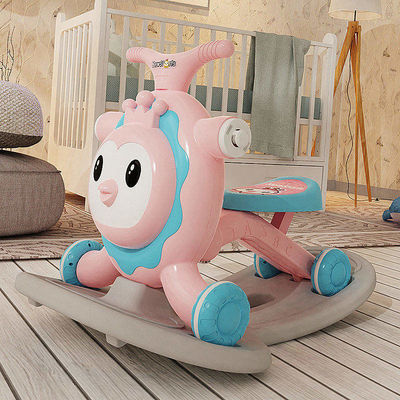 Scooter rosa multifuncional para niños con función de caminante y diseño de sacudir un caballo