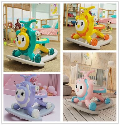 Scooter rosa multifuncional para niños con función de caminante y diseño de sacudir un caballo