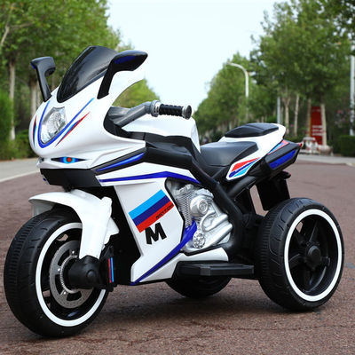 Niños de 2 a 8 años de edad montan en motocicleta con música y luz / batería recargable de 12V