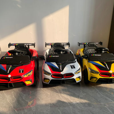 Coches eléctricos para niños con control remoto y paseo ligero en cartón tamaño 85*45*25.5