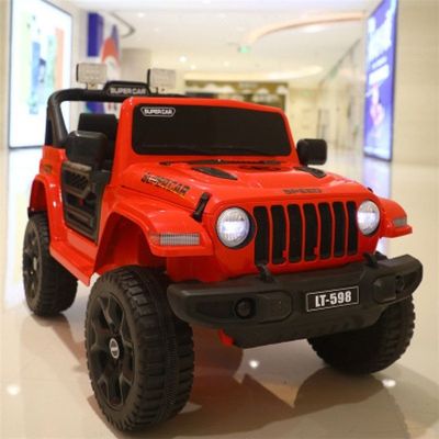 Los niños viajan en un coche eléctrico 12V de 2 plazas con control remoto y batería recargable
