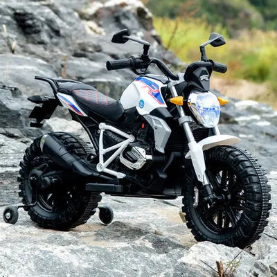 Conducción de motocicleta todoterreno en coche eléctrico para niños con control remoto incluido